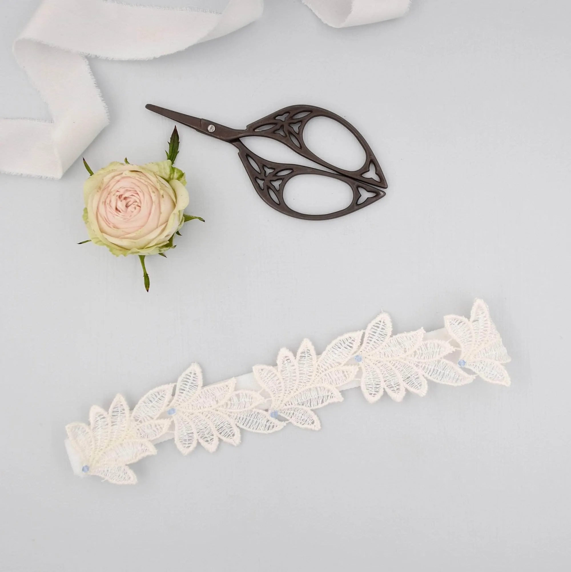 Bridal garter set - Super sleek lace leaf wedding garter and matching toss garter - 'Elme'