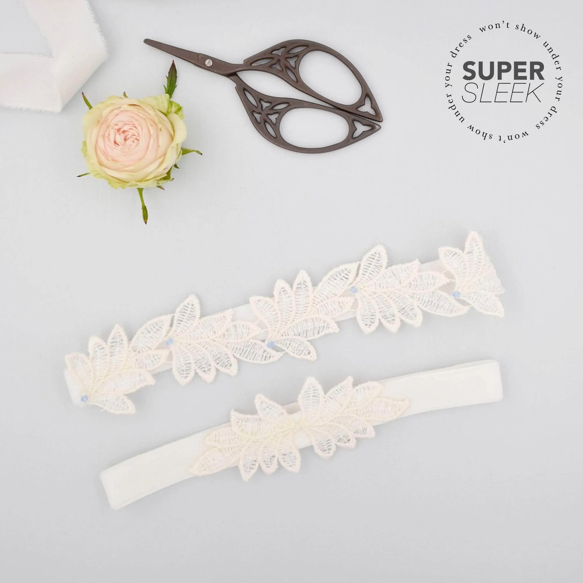 Bridal garter set - Super sleek lace leaf wedding garter and matching toss garter - 'Elme'